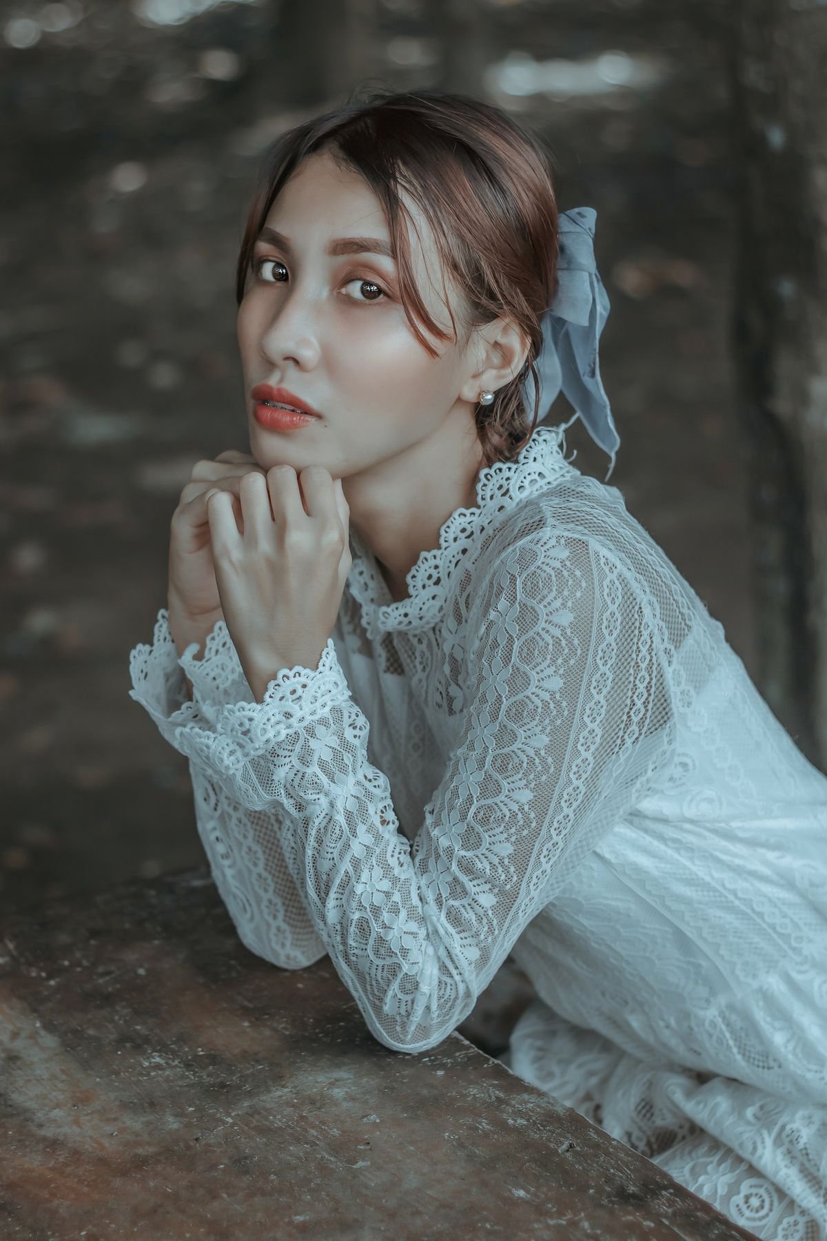 Lace outfit worn with a winter coat and boots