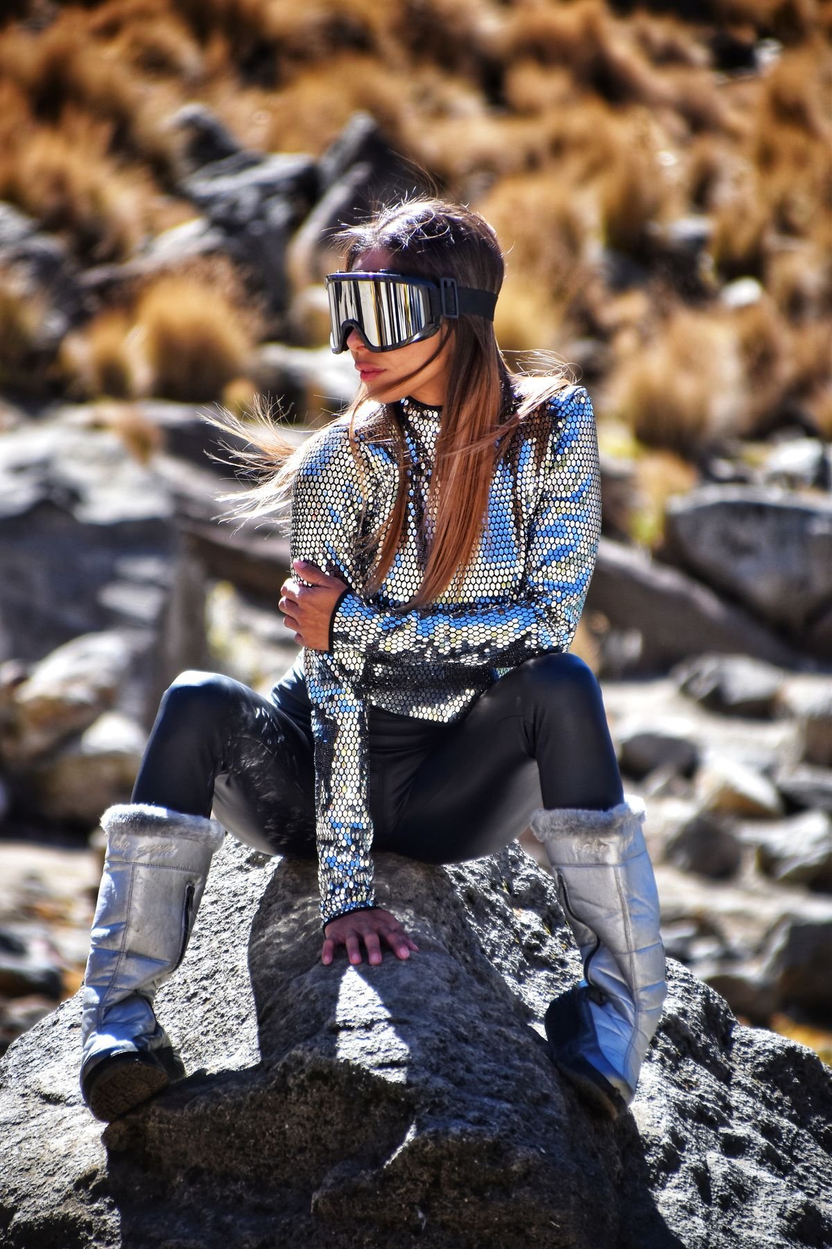 Woman in classic tall UGG boots with leggings and an oversized knit